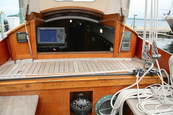 Slide: The Image of 1958 Concordia Yawl cockpit with navigation equipment and compass. - 21
