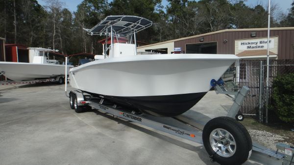 Slide: The Image of 2024 Contender 28T boat on trailer at Hickory Bluff Marine. - 2