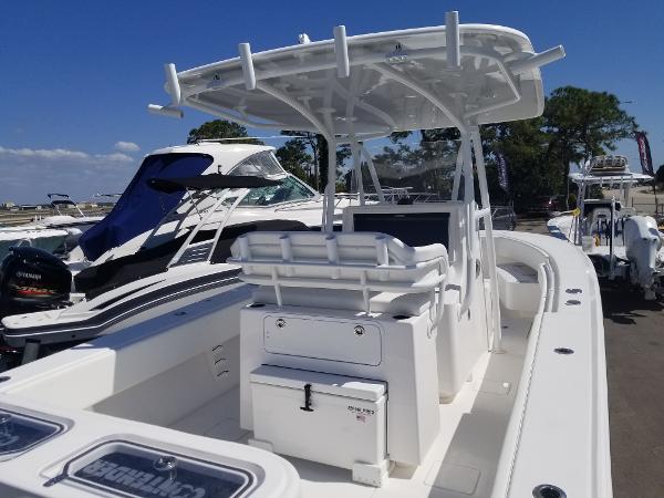 Slide: The Image of 2024 Contender 30 ST center console boat at marina. - 1
