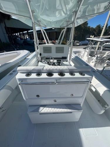 Slide: The Image of 2025 Contender 35 ST boat interior with modern console and seating. - 17