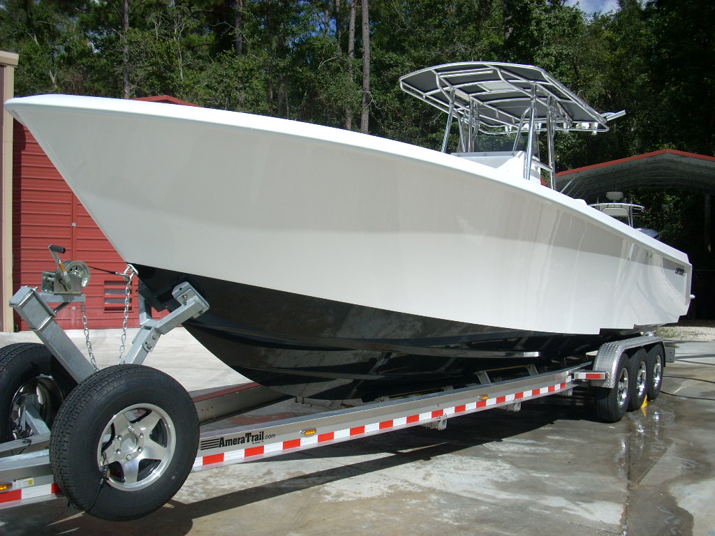 Slide: The Image of 2024 Contender 35 ST STEP HULL boat on trailer, ready for transport. - 1