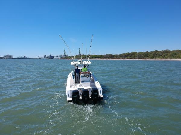 Slide: The Image of 2008 Contender 36 Fish Around boat cruising on open water. - 20