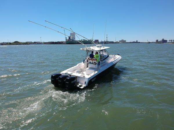 Slide: The Image of 2008 Contender 36 Fish Around boat cruising on open water. - 21