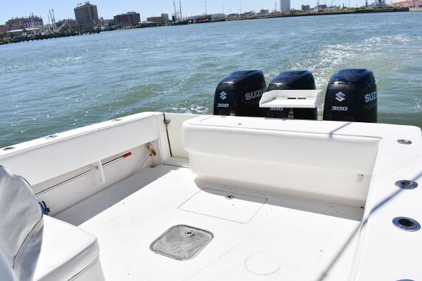 Slide: The Image of 2008 Contender 36 Fish Around boat with Suzuki 300 engines on the water. - 8