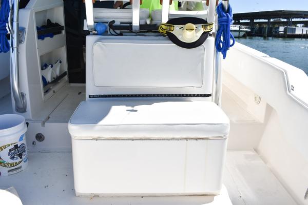 Slide: The Image of 2008 Contender 36 Fish Around boat interior with seating and storage. - 9