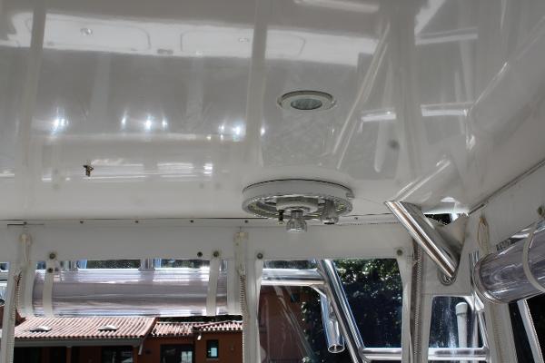Slide: The Image of 2008 Contender 38 Express boat interior ceiling with light fixture. - 11