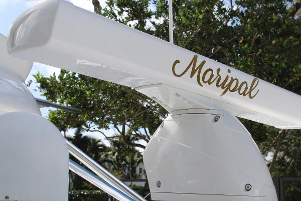 Slide: The Image of Close-up of 2008 Contender 38 Express boat with Maripol name. - 12