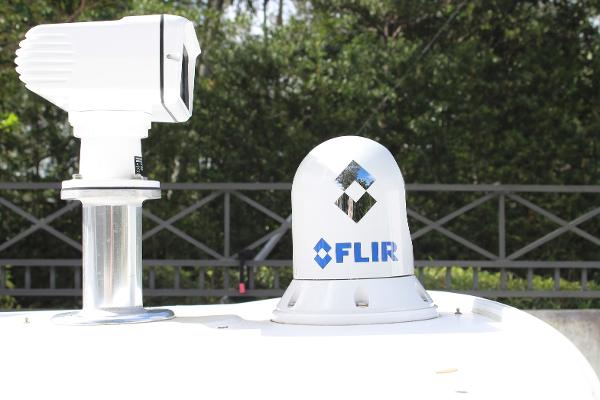 Slide: The Image of FLIR camera system on a 2008 Contender 38 Express boat. - 13