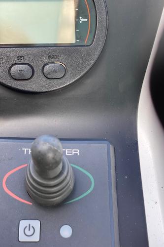 Slide: The Image of Close-up of 2008 Contender 38 Express boat throttle control and display. - 18