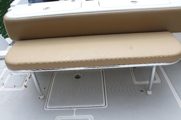 Slide: The Image of Contender 38 Express 2008 boat seating and storage compartments. - 26