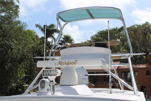 Slide: The Image of 2008 Contender 38 Express boat with upper deck and radar equipment. - 3