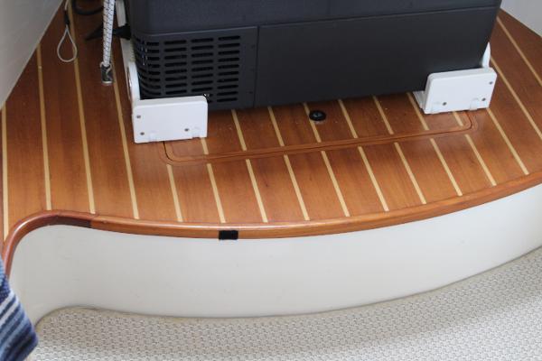 Slide: The Image of 2008 Contender 38 Express boat interior with wooden flooring and equipment. - 43