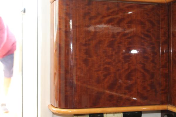 Slide: The Image of Polished wooden interior of a 2008 Contender 38 Express boat. - 47