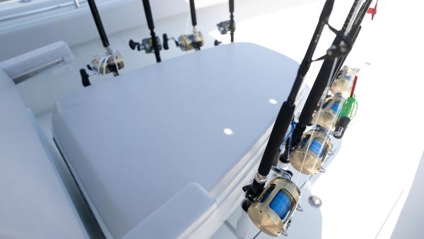 Slide: The Image of Fishing rods on a 2024 Contender 39 ST boat. - 14