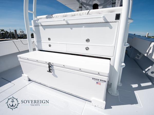 Slide: The Image of 2024 Contender 44 CB yacht deck with storage compartments by Sovereign Yachts. - 16