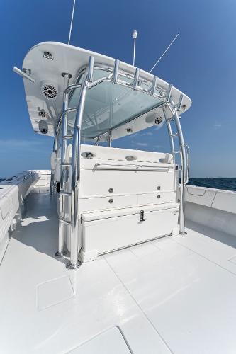 Slide: The Image of Contender 2025 44ST boat with sleek design and modern features on open water. - 32