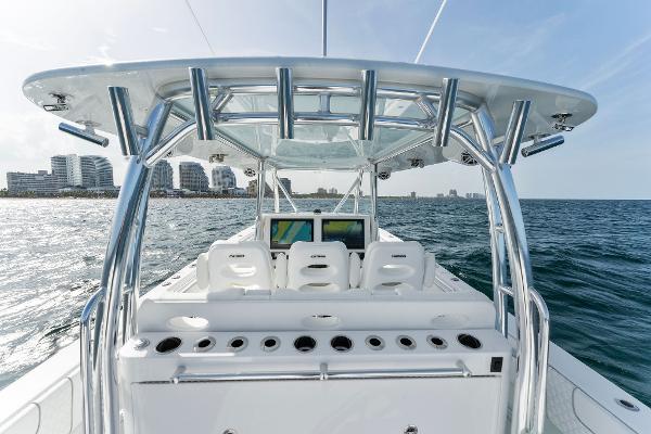 Slide: The Image of Contender 2025 44ST boat with advanced navigation system and ocean view. - 37