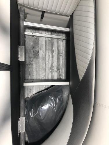 Slide: The Image of 2018 Crest II 230 SLC boat interior with ladder and seating. - 3