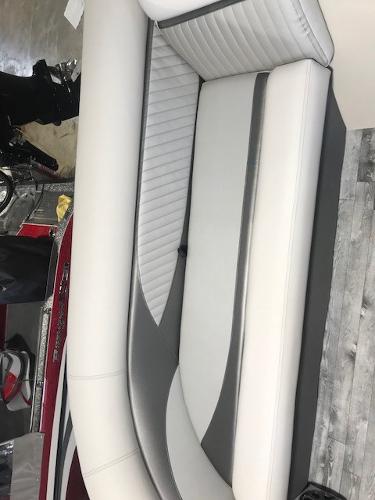 Slide: The Image of 2018 Crest II 230 SLC boat interior with white and gray seating. - 5