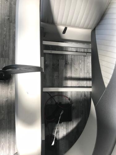 Slide: The Image of Interior view of a 2018 Crest II 230 SLC boat with seating and flooring. - 6