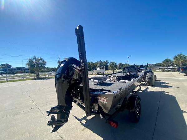 Slide: The Image of 2023 Crestliner 1600 Storm boat with Mercury outboard motor on trailer. - 3