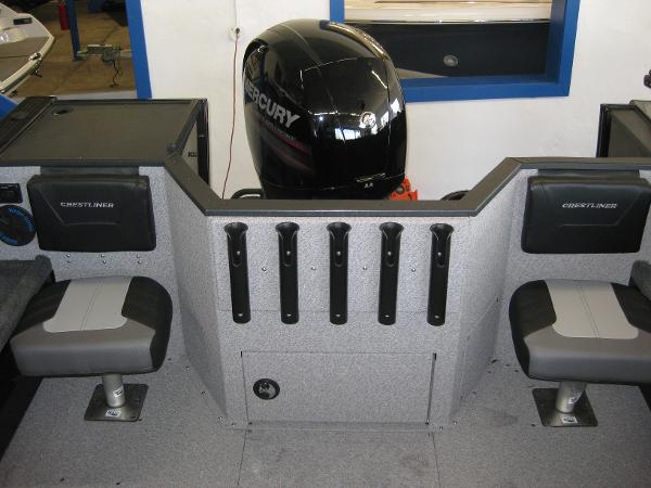 Slide: The Image of Interior of 2025 Crestliner 2050 Commander boat with Mercury outboard motor. - 5