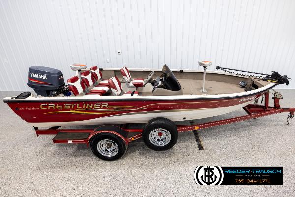 Slide: The Image of 2005 Crestliner 1750 FISHHAWK boat with Yamaha motor on red trailer. - 1