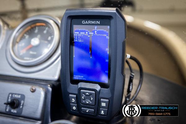 Slide: The Image of Garmin fishfinder on 2005 Crestliner 1750 FISHHAWK dashboard, displaying sonar data. - 31