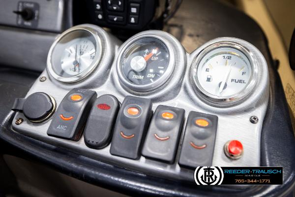 Slide: The Image of Dashboard of 2005 Crestliner 1750 FISHHAWK boat with gauges and switches. - 32