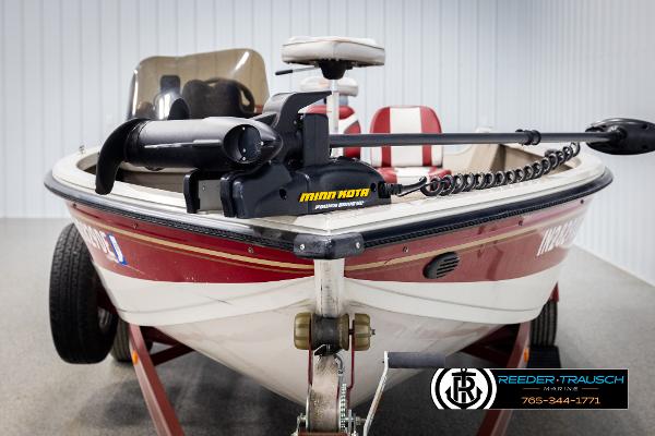 Slide: The Image of 2005 Crestliner 1750 FISHHAWK boat with Minn Kota trolling motor in a showroom. - 6