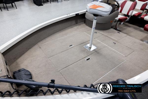 Slide: The Image of 2005 Crestliner 1750 FISHHAWK boat interior with seating and storage compartments. - 8