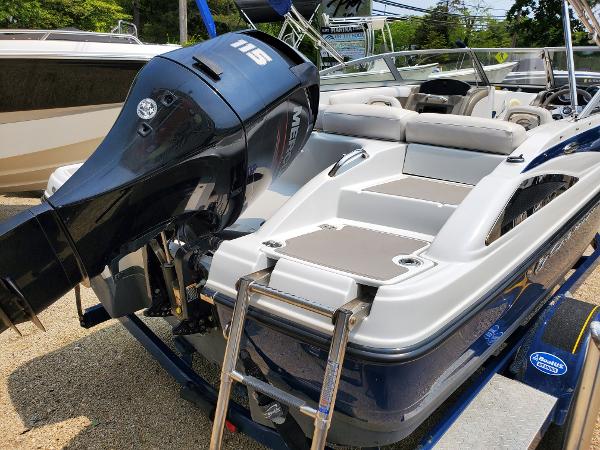 Slide: The Image of 2013 Crownline 19XS boat with 115 HP Mercury outboard motor. - 11