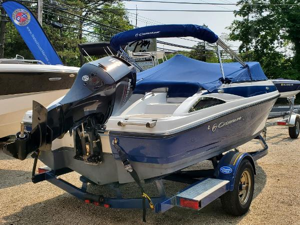 Slide: The Image of 2013 Crownline 19XS boat on trailer with outboard motor. - 3