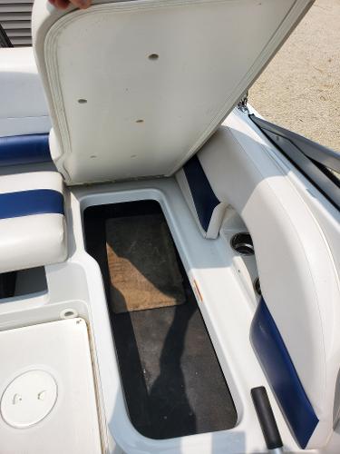 Slide: The Image of 2013 Crownline 19XS boat interior storage compartment. - 8