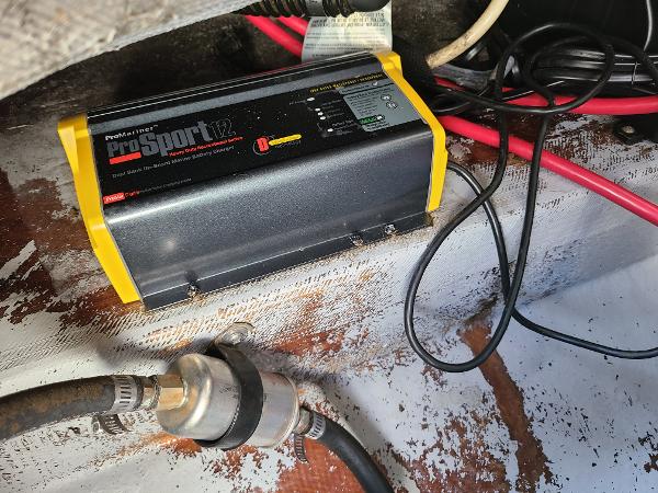 Slide: The Image of Battery charger in the engine compartment of a 2003 Crownline 230BR boat. - 19
