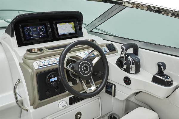 Slide: The Image of 2024 Crownline 280 CRX boat cockpit with advanced navigation and control systems. - 10