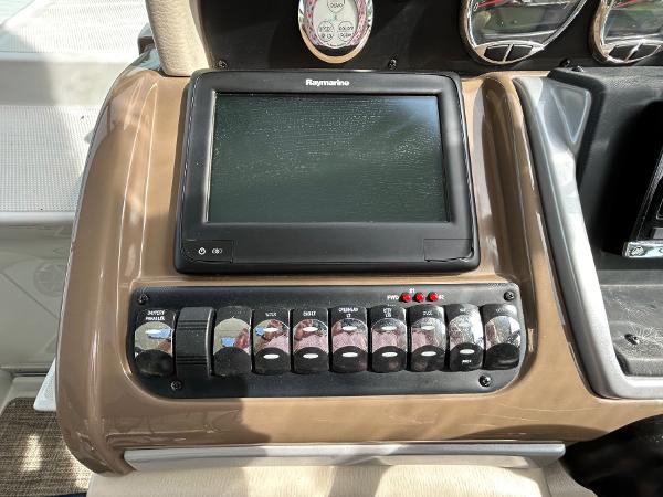 Slide: The Image of Control panel of a 2015 Crownline 350 SY boat with Raymarine display. - 18