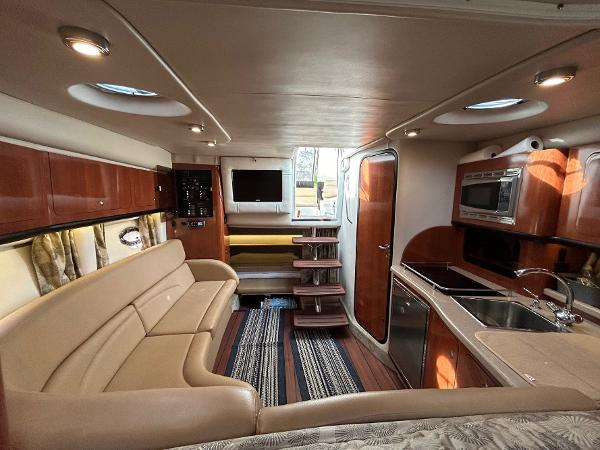 Slide: The Image of Luxurious interior of a 2015 Crownline 350 SY yacht with modern amenities and elegant design. - 3