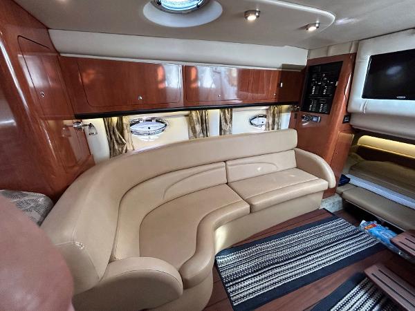 Slide: The Image of Luxurious interior of a 2015 Crownline 350 SY yacht with elegant seating and modern amenities. - 4