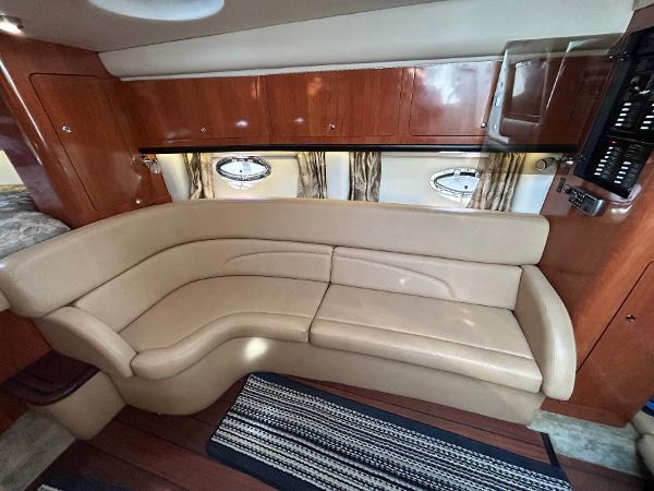 Slide: The Image of Luxurious interior of 2015 Crownline 350 SY yacht with beige leather seating. - 5