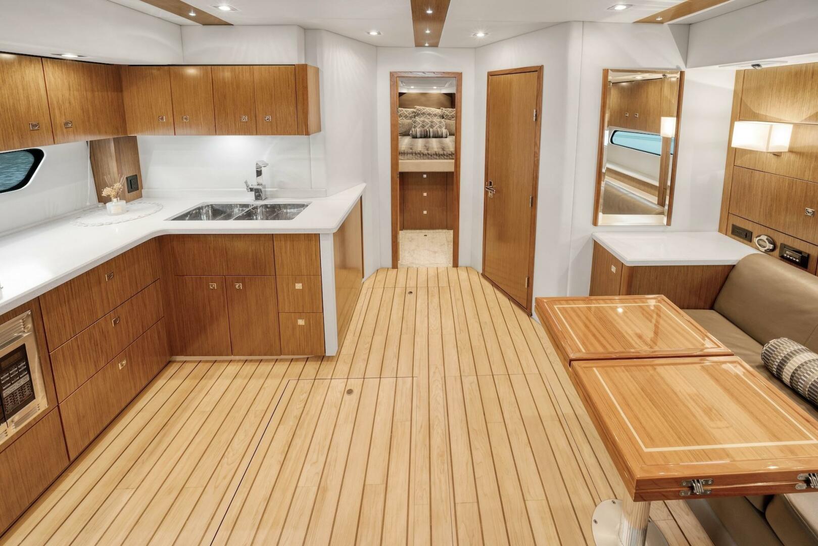 Slide: The Image of 2015 Cruisers Yachts 48 Cantius - Lower Dinette and Galley - 5117012