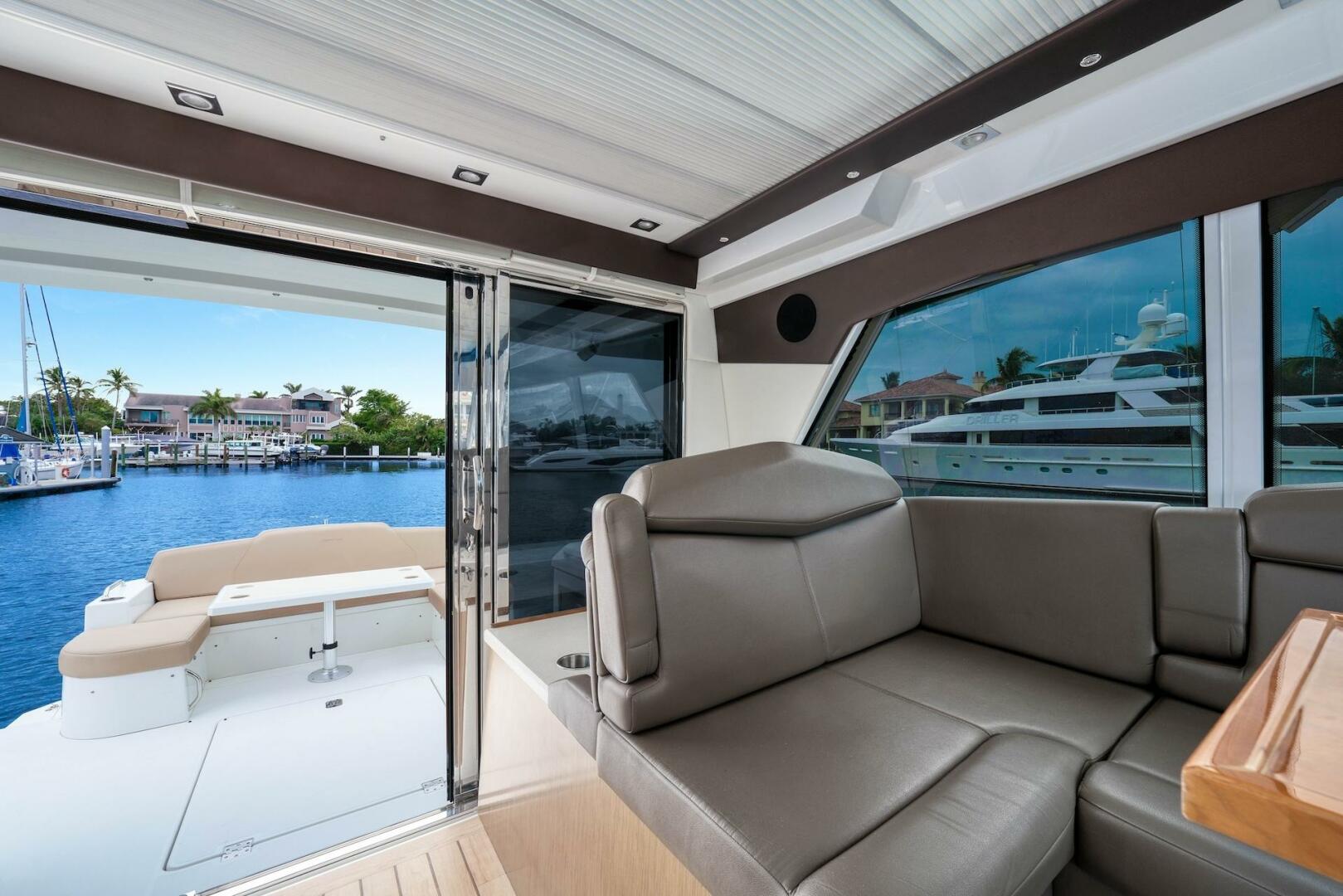 Slide: The Image of 2015 Cruisers Yachts 48 Cantius - Upper Salon & View of Cockpit - 5117037