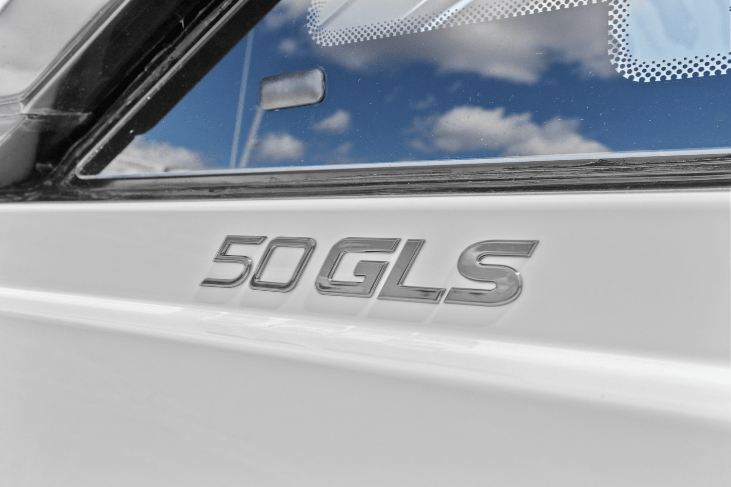Slide: The Image of Cruisers 50 GLS Outboard 2025 - 2