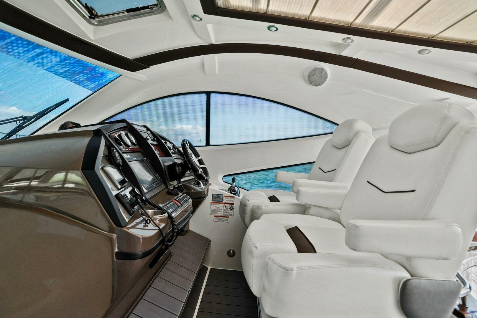 Slide: The Image of 2014 Cruisers Yachts 540 Sport Coupe - Helm - 5342392