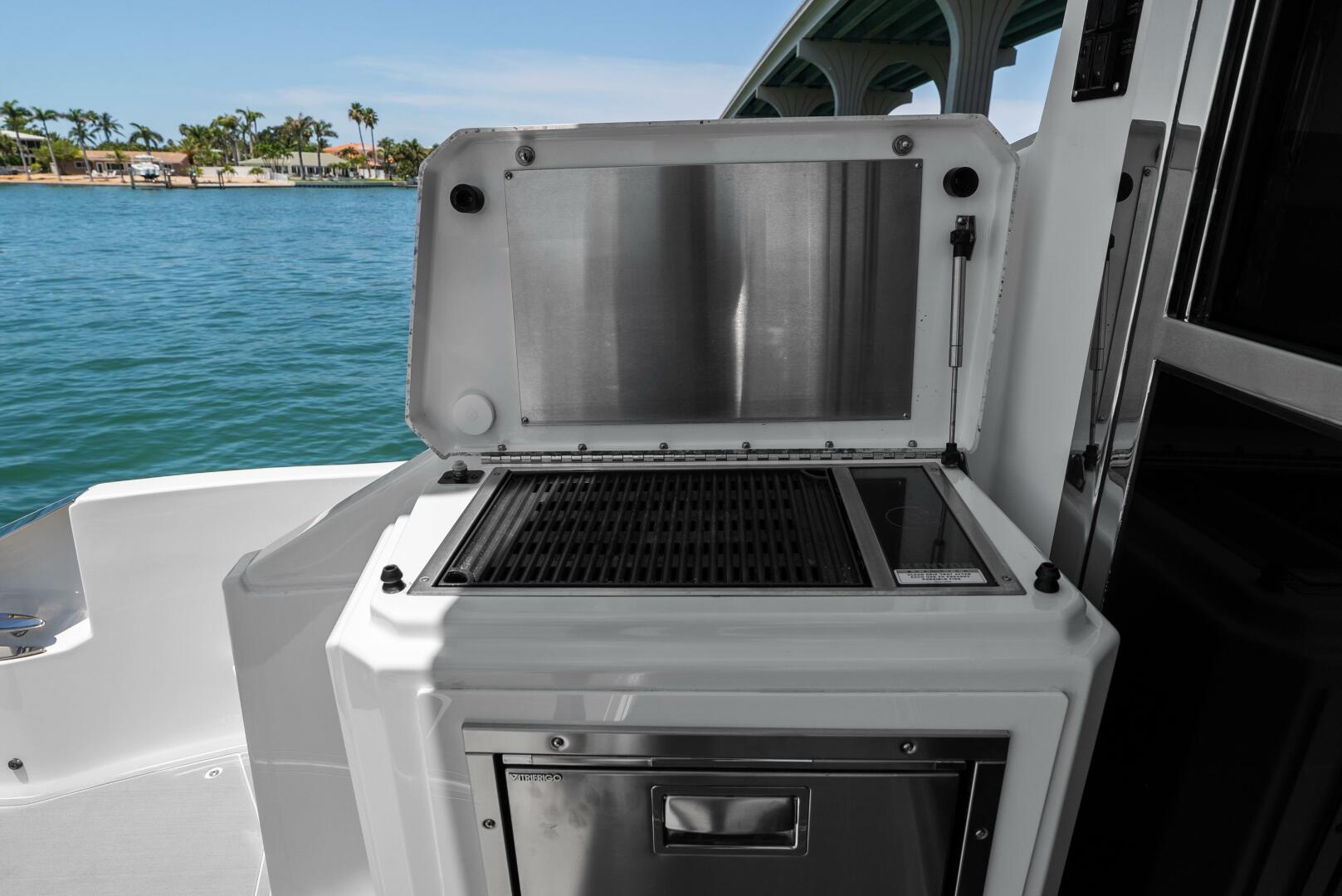 Slide: The Image of 2021 Cruiser Yachts 60 Cantius - Cockpit Grill and Refrigerator - 5432292