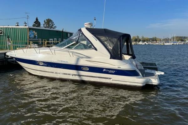 The Image of 2005 Cruisers Yachts 340 Express docked on a sunny day. - 0