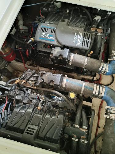 Slide: The Image of Engine compartment of 2001 Cruisers Yachts 3470 Express with twin 7.4 MPI V8 engines. - 10