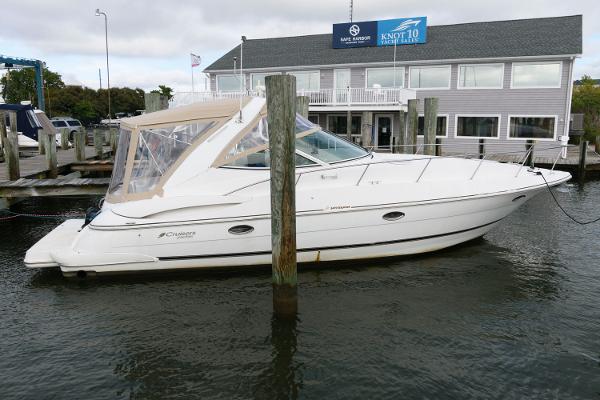 Slide: The Image of 2002 Cruisers Yachts 3470 Express docked at marina. - 0