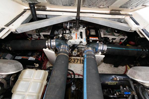 Slide: The Image of Engine compartment of a 2002 Cruisers Yachts 3470 Express boat. - 20