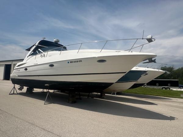 The Image of 2003 Cruisers Yachts 3470 Express on stands, side view. - 0